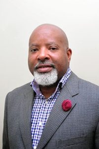 Kenneth G. Cooper, Executive Director